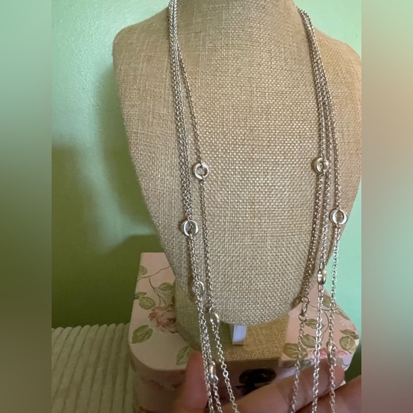 Elegant Silver Layered Necklace with Circular Accents - Picture 3 of 7